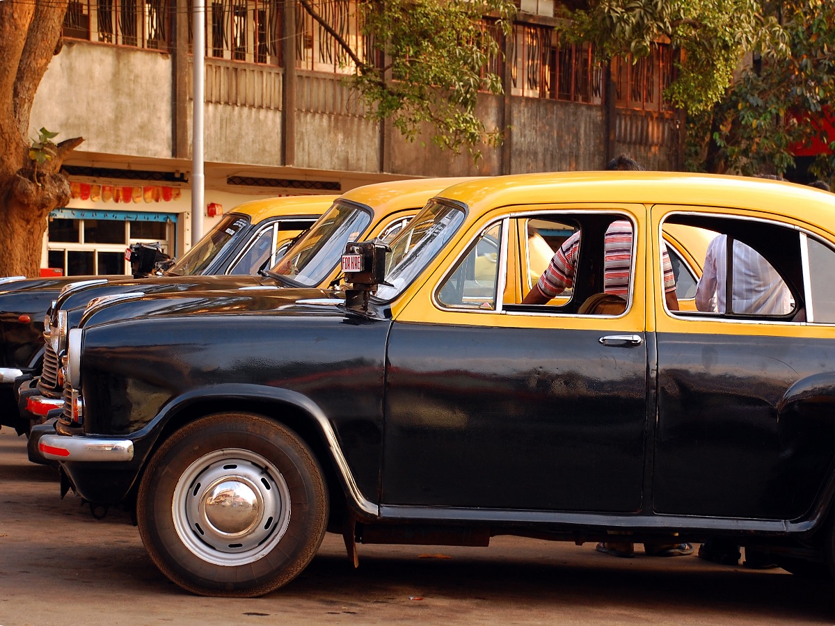 Row of taxis used for shared and for-hire mobility