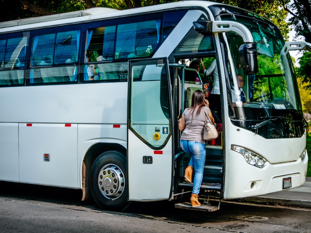 Passenger boarding a staff or school transport bus